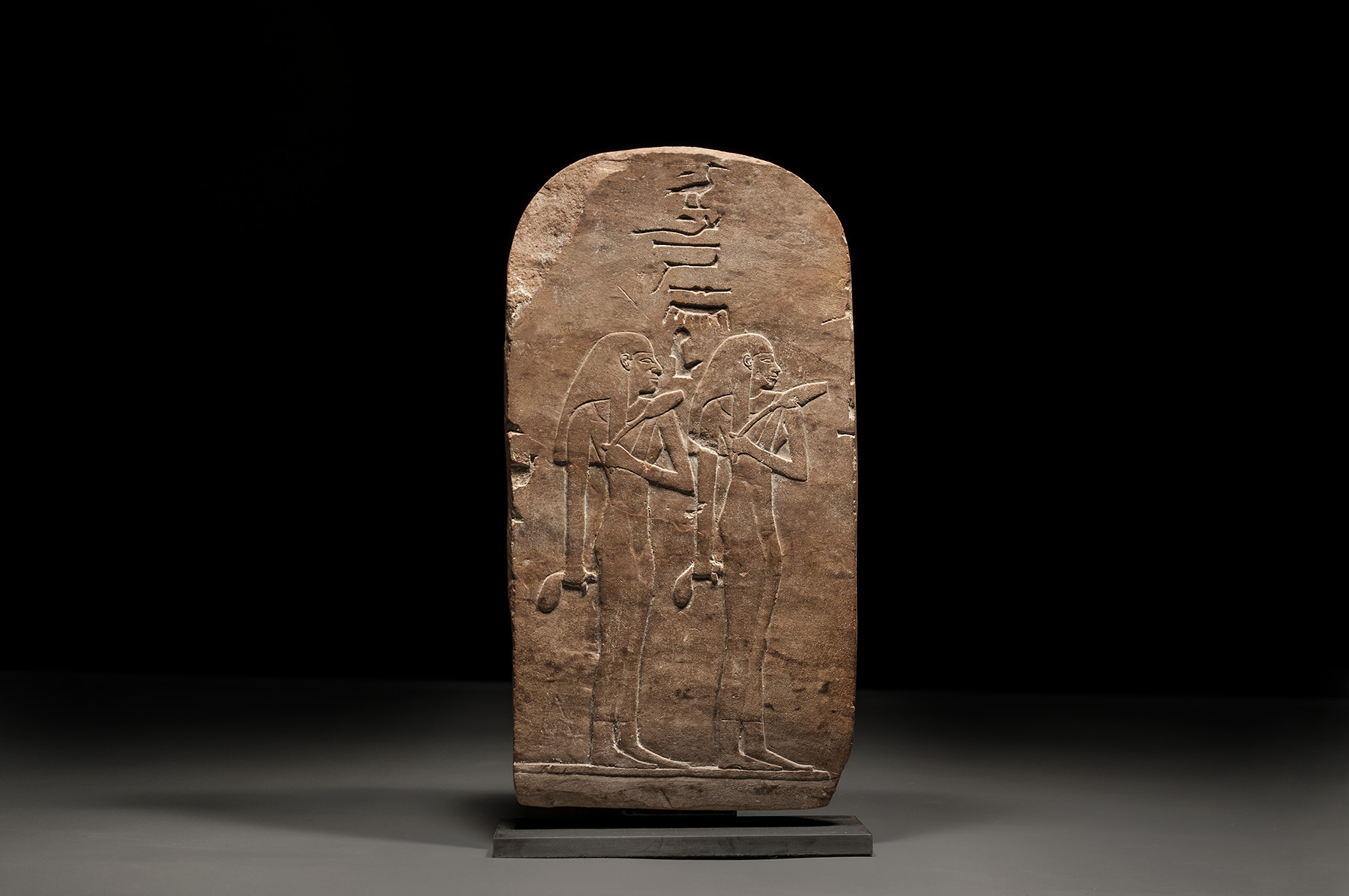 Egyptian Bas-Relief Pink Limestone Fragment with Two Female Figures