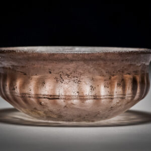 An Aubergine Ribbed Glass bowl