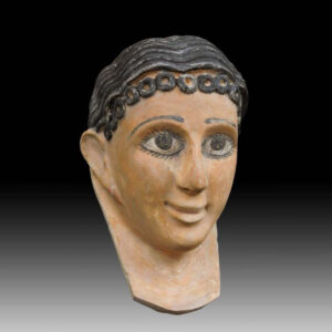 A Fine Egyptian Gypsum Mask of a Young Girl