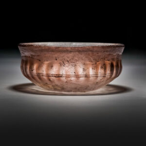 An Aubergine Ribbed Glass bowl