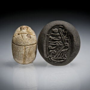 A Hyksos Scarab Decorated with Horus Falcon Wearing Red Crown and Hieroglyphs