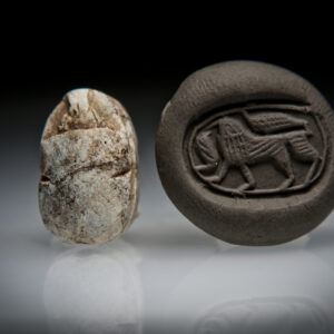 Canaanite Steatite Scarab Seal with a Striding Lion and a Cobra