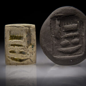 An Egyptian Steatite Double sided Stamp Seal with a Hieroglyph and a Two