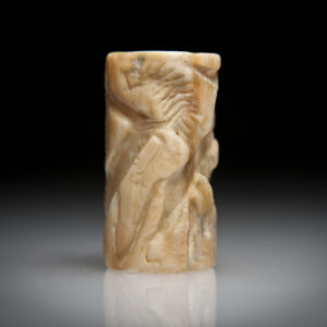 An Akkadian Plagioclase Cylinder Seal with Two Lions Attacking Two Deer
