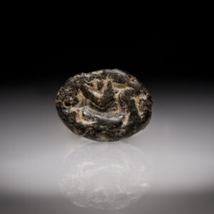 An Andesite Persian Scaraboid Seal with an Animal